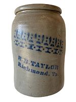 Front view of antique stoneware crock showing cobalt blue decorative band and lettering 'E.B. TAYLOR Richmond, Va.'