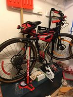 Overall view of bicycle with pump and rack