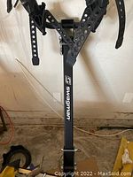 Front view of Swagman bike rack showing adjustable straps and logo.