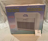 Front view of HeavenFresh Multi-Tech XJ-3000C Ionic Air Purifier box showing product image and key features including UV light and HEPA filter.
