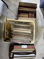 Three boxes of vinyl records in crates visible from above