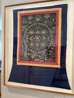 Full frontal view of framed silk Tanka showing cloth and frame