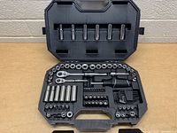 Complete view of the open Husky tool set case showing all tools included.