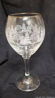Single goblet photo showing frosted winter scene etching and gold trimmed rim