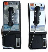 Front view of both payphone units side by side showing chrome faceplates, coin slots and handsets