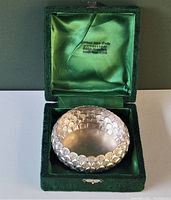 Silver candy bowl inside original green velvet box with satin lining interior displaying the maker's imprint.