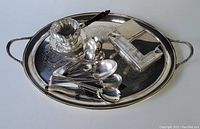 Photo showing the full set on the tray, including the sauce bowl, condiment server, and assorted spoons.