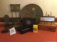 Group shot showing all metal stands, decorative plate, tins and wooden box