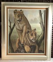 Full view of framed lion and lioness giclee print showing the entire artwork and frame details