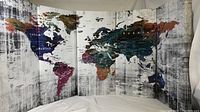 Wide view of all five canvas panels together showing full world map design and distressed background.