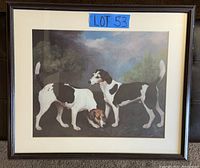 Front view of framed dog print showing two dogs against a nature background.