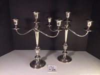 Both Gorham three-arm candelabra side by side