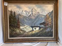 Framed oil on canvas painting showing the full mountain scene and frame.