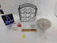 Photo showing full set including LED beer sign, glass vase, wine rack, knife, punch bowl with glasses and ladle