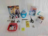Full view of sewing items including books, threads, tools, and bracelet maker.