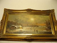 Frontal view of the oil painting in ornate gilded frame depicting a winter scene