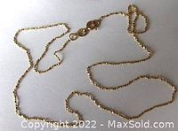 Full view of the vintage 10K yellow gold chain showing the length and style of the delicate link design.