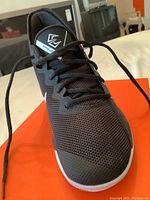 Front view showing the black mesh upper and lacing on the Nike Zoom Evidence 111 shoe
