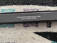 Black box with text www.ionpowerbracelet.com Ionic Healthy Jewelrys, indicating the brand of the magnetic bracelet