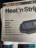 Box showing Black & Decker Heat 'n Strip, electric paint remover, electric heat gun, with functions listed, slightly worn.