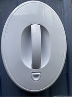 Top view of insulated locking serving dish lid featuring central handle