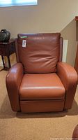 Front perspective view of leather recliner chair