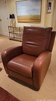 Front right three-quarter view of brown leather recliner