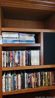 Shelf view showing multiple DVD box sets including Stanley Kubrick Collection and various movies and series.