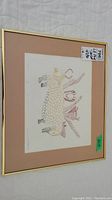 Framed and matted Inuit print titled "Spirits" from Dorset 1975, numbered 47/50, showing the entire artwork and frame.