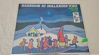 Full view of signed Ted Harrison poster titled 'Harrison at Hollander York, Toronto 1984' showing colorful stylized figures walking in snow.