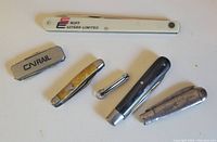 Overview of six vintage pocket tools with distinct handles and brands including Swift Eastern Limited and CN Rail