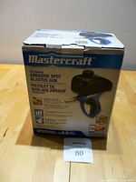 Mastercraft branded box showing product image and name 'Abrasive Spot Blaster Gun'