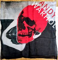Full view of the bandana showcasing the red skull artwork with 'Andy Warhol' text and exhibition information.