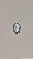 Top view of the sky blue natural aquamarine gemstone showing long cushion cut facets and clarity