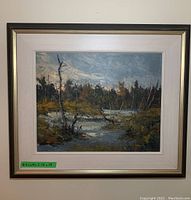 Full view of framed oil painting depicting a wetland landscape by W. F. Griffiths