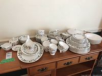 Overview of Wedgwood Beaconsfield dinnerware set on dresser