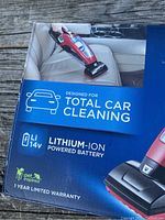 Close-up of product box highlighting 14V lithium-ion battery and automotive use.