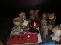 Group of vintage perfume bottles including boxed set, ceramic, glass with atomizers