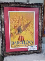 Full view of the framed Barcelona print showing the entire artwork, frame, and mat.
