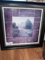 Full view of the framed art showing the purple faux tile border and grayscale pathway scene.