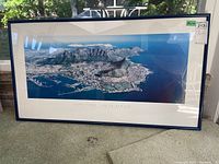 Photo of the entire framed aerial photograph of Cape Town showing dimensions and framing style.
