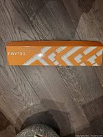 Closed orange and white box labeled Delamu containing cable concealer kit items.