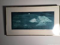Full view of framed limited edition etching Arctic Mountains by I.J. Browning showing blue mountainous landscape with moon.
