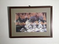 Framed original acrylic impressionist forest scene painting hung on a wall.