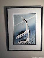 Full view of the framed serigraph showing two birds in water.