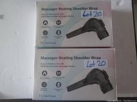 Two boxed HailiCare massager heating shoulder wraps showing front packaging with product image and features.