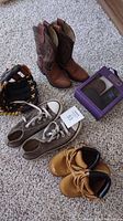 Full lot photo showing vintage Bronco boys cowboy boots, Converse gray sneakers, Pediped toddlers shoes, and boys work boots.