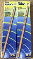 Photo of two unopened boxes of Dixon Oriole No. 2 HB wooden pencils showing front packaging with pencil image and product details
