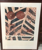 Photo of signed silkscreen and painted abstract artwork on cotton fiber paper framed with painted frame matching artwork colors. Shows geometric shapes and patterns in brown, beige, dark blue.