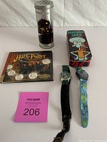 Full lot including Harry Potter ReelCoinz set, Star Wars Episode III watch in metal tin, Squidward Carlo watch tin, Lilibiggs and Madagascar character watches